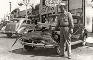 Vern ‘Doc’ Spice and catch in front of his bar, Chula Vista, California, August 1940